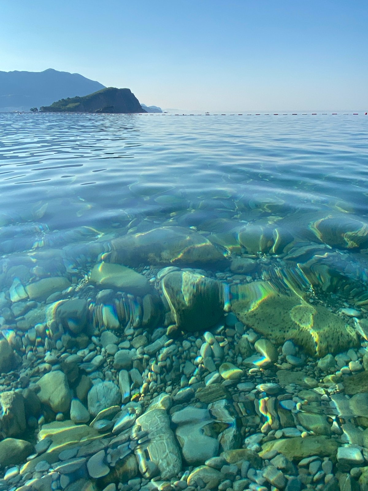 Fishing and coastline exploration along Budva's rocky shores
