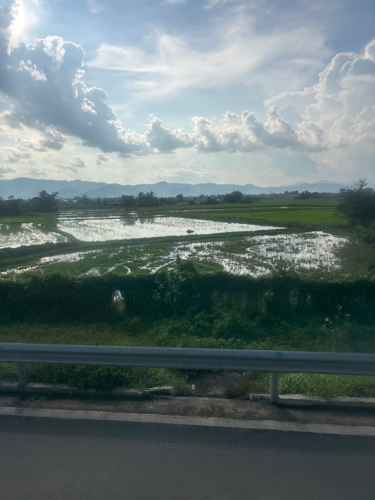 Morning drive through Vietnam's rural countryside, fields and mountains