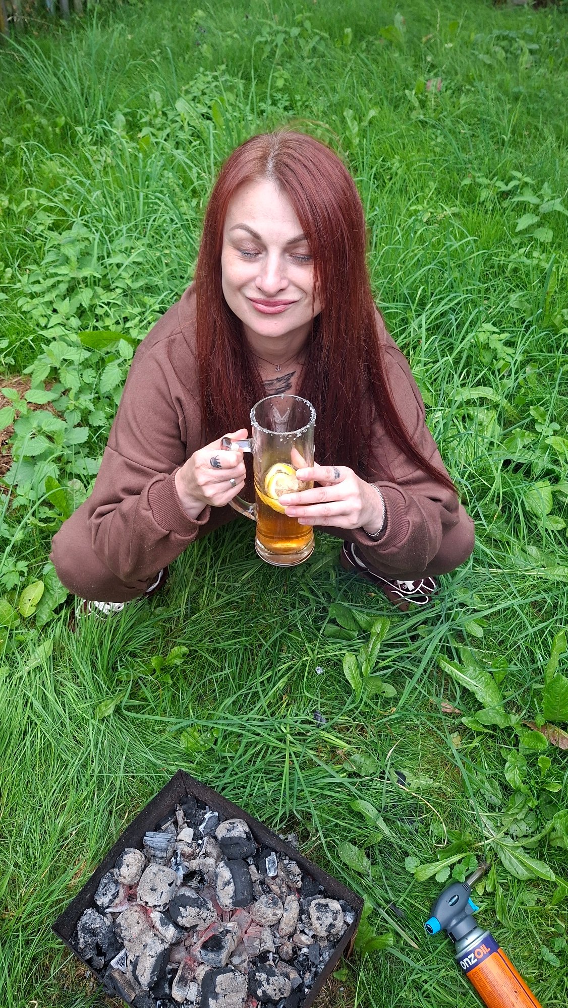 Backyard grill session with drinks on a Belarus summer afternoon
