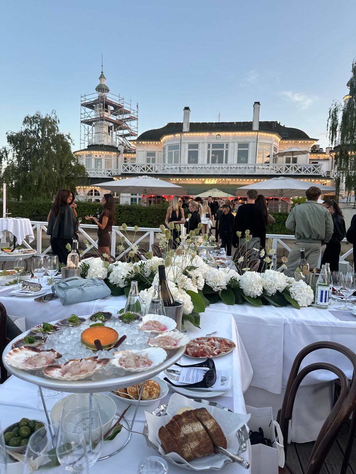 Waterfront dinner event in Copenhagen with oysters and wine
