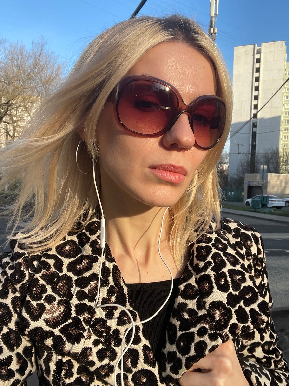 Woman in sunglasses photographed in Moscow