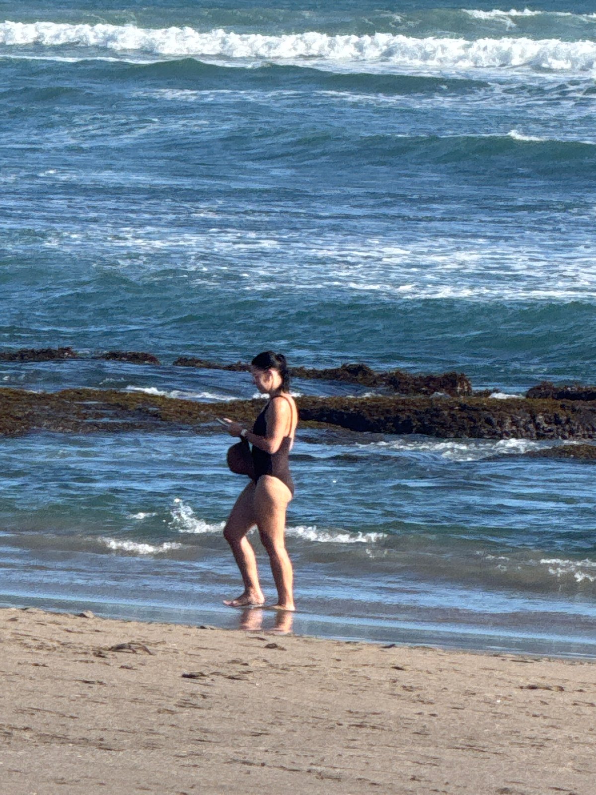 Morning beach activity captured at North Kuta, Indonesia