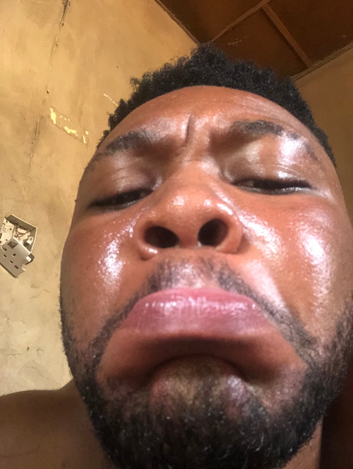 Portrait session captures Black man in multiple close-up shots