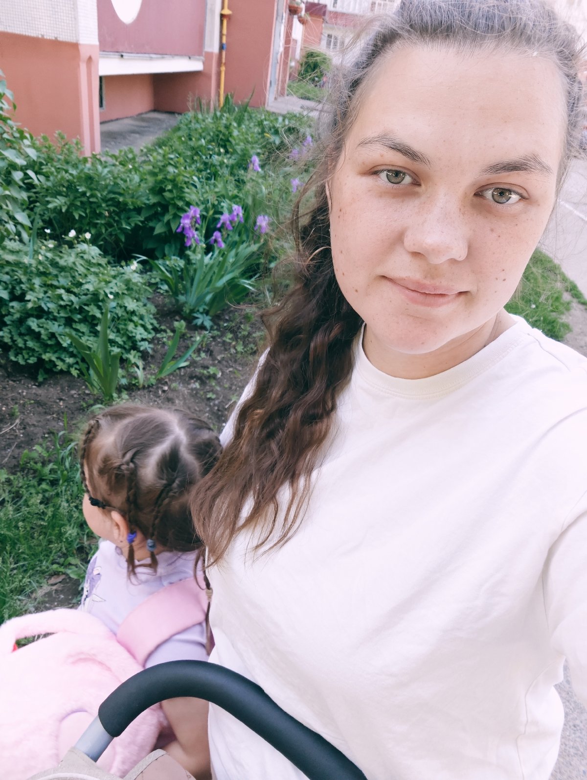 Family enjoys morning playground time in Chaikovsky, Russia