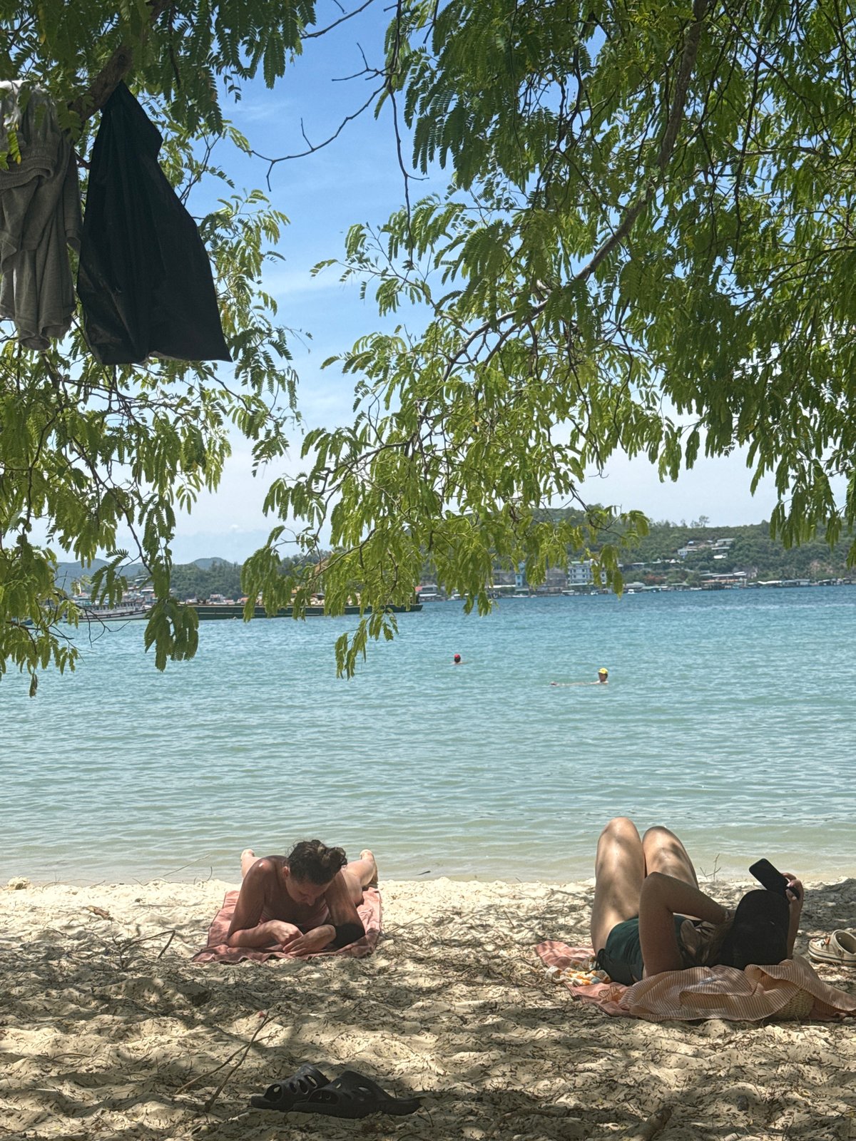 Lazy morning on Nha Trang beach, sun and turquoise water