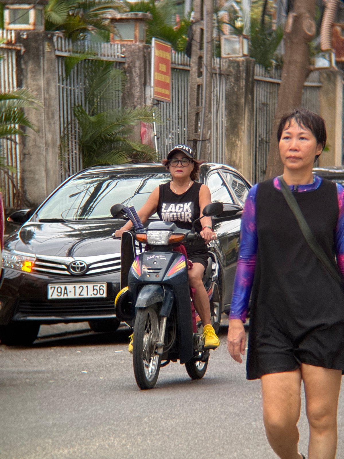 Everyday street life moving through Nha Trang's neighborhoods