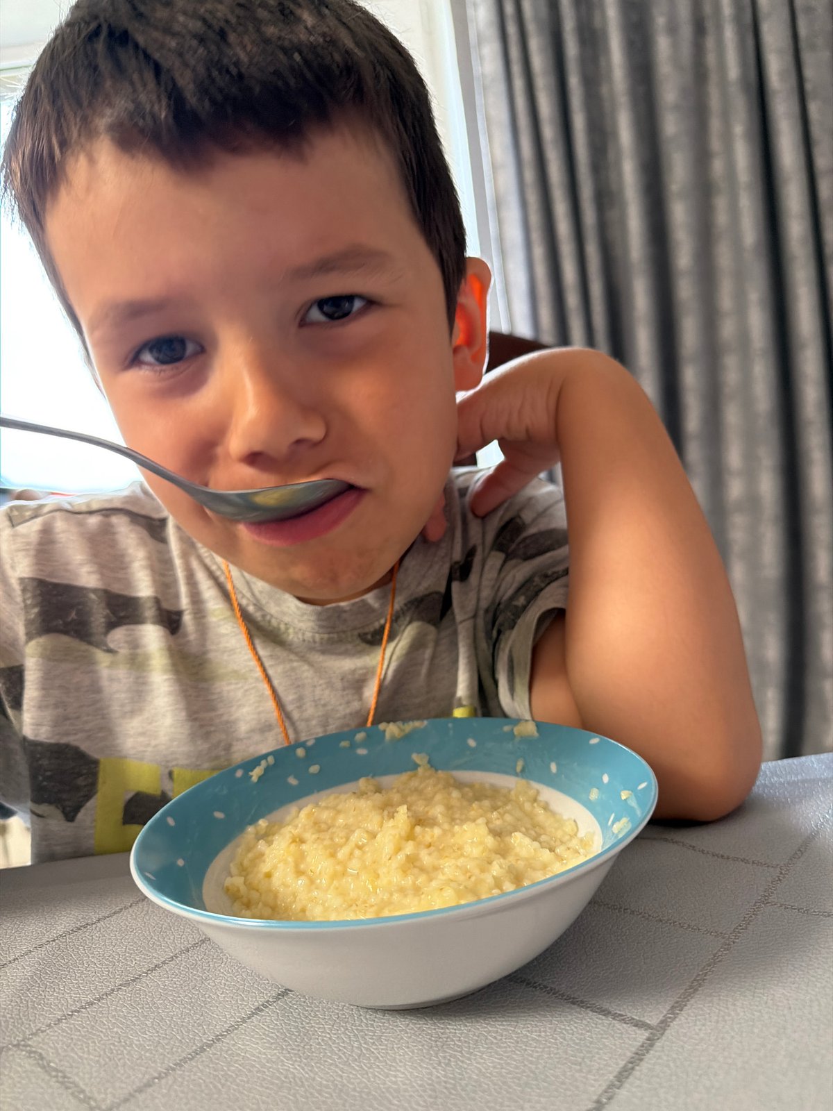 Breakfast porridge shared around a table in Chaikovsky