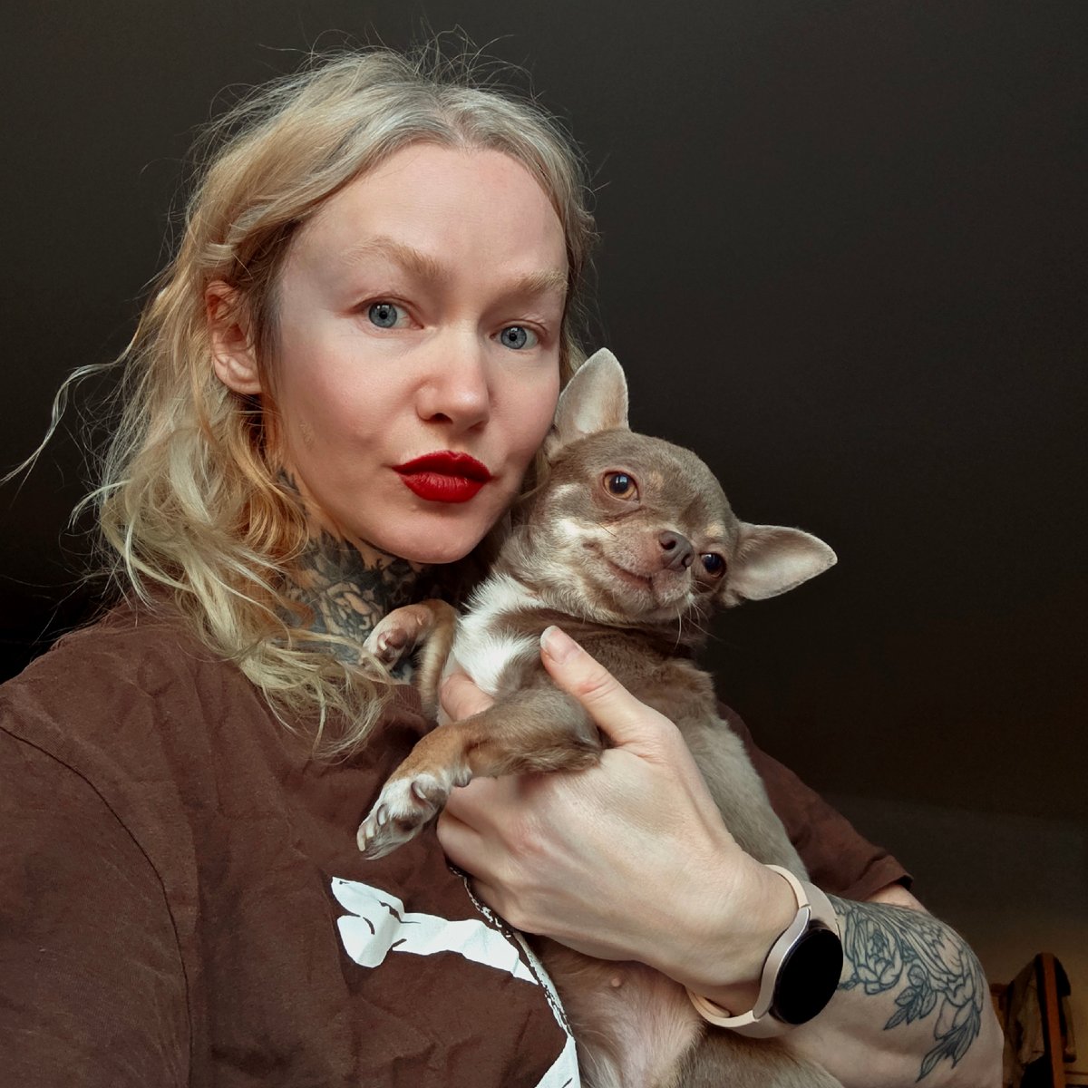 Dog owners and pets captured in quiet Saint Petersburg moments