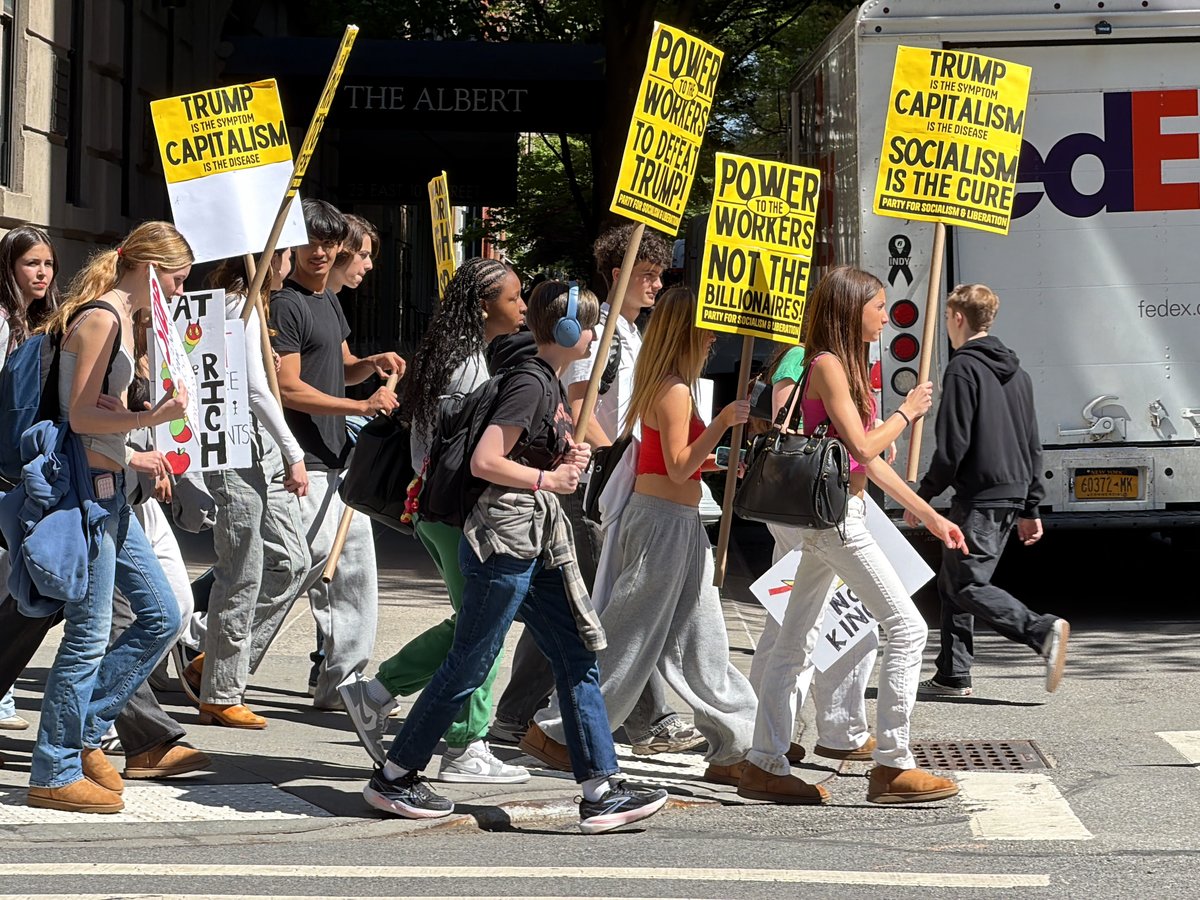 Anti-capitalist protesters march through NYC streets on May Day
