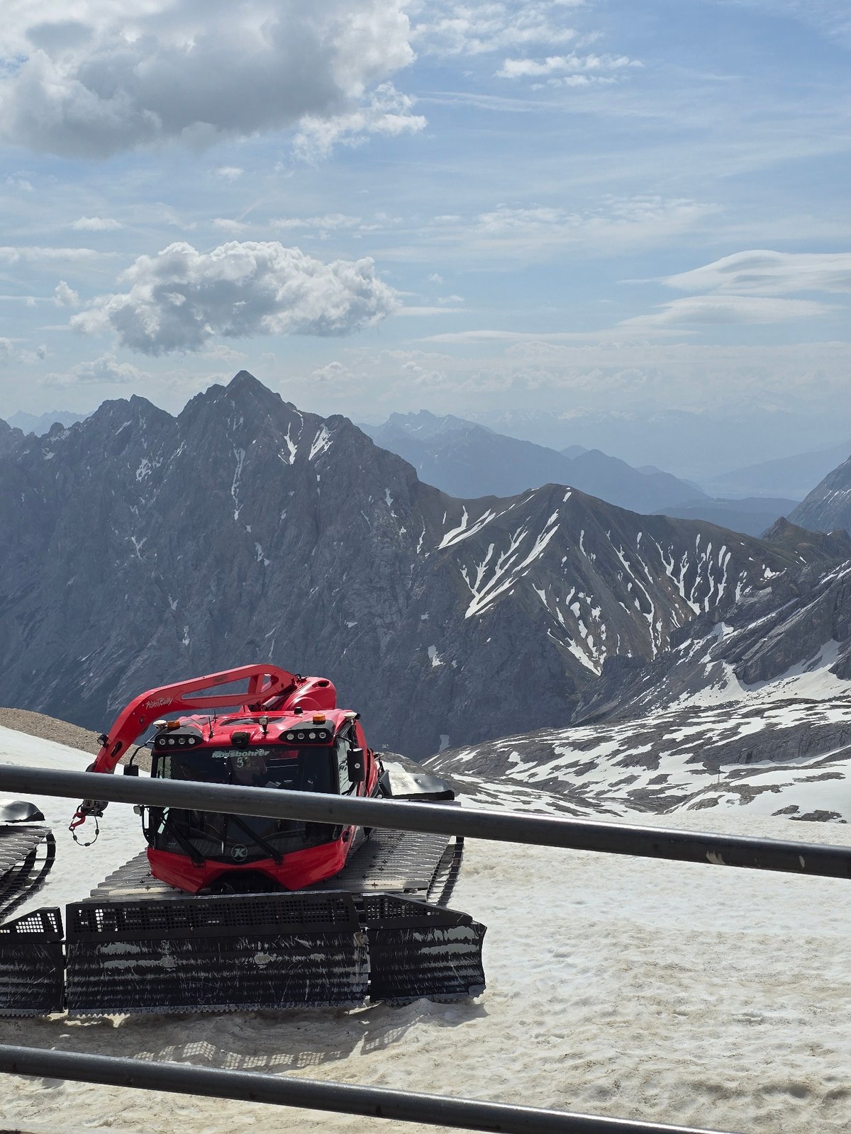 Morning tourism activity captured at Zugspitze summit in Bavaria