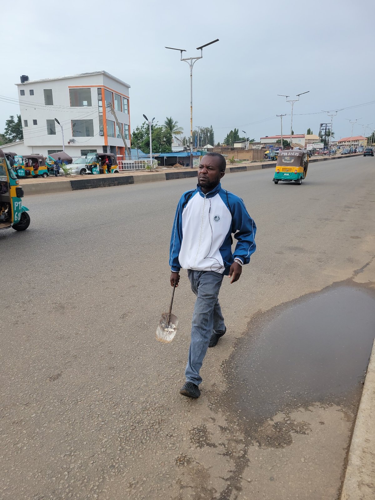 Morning street life documented across Jos, Nigeria neighborhoods
