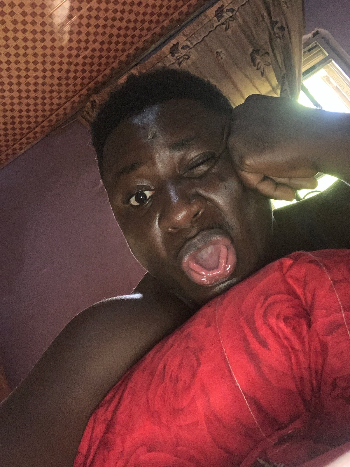 Person photographed resting indoors in Akwanga, Nigeria
