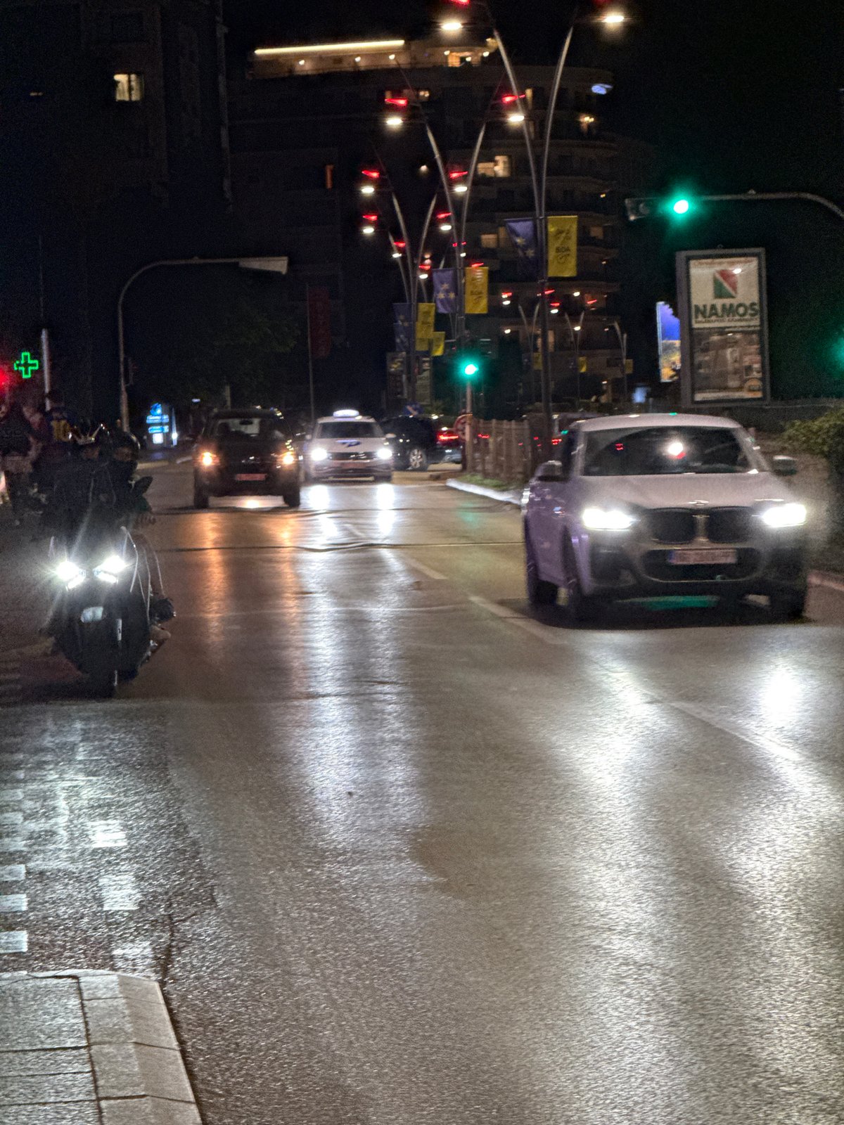 Evening street tour through wet Budva with garage stops