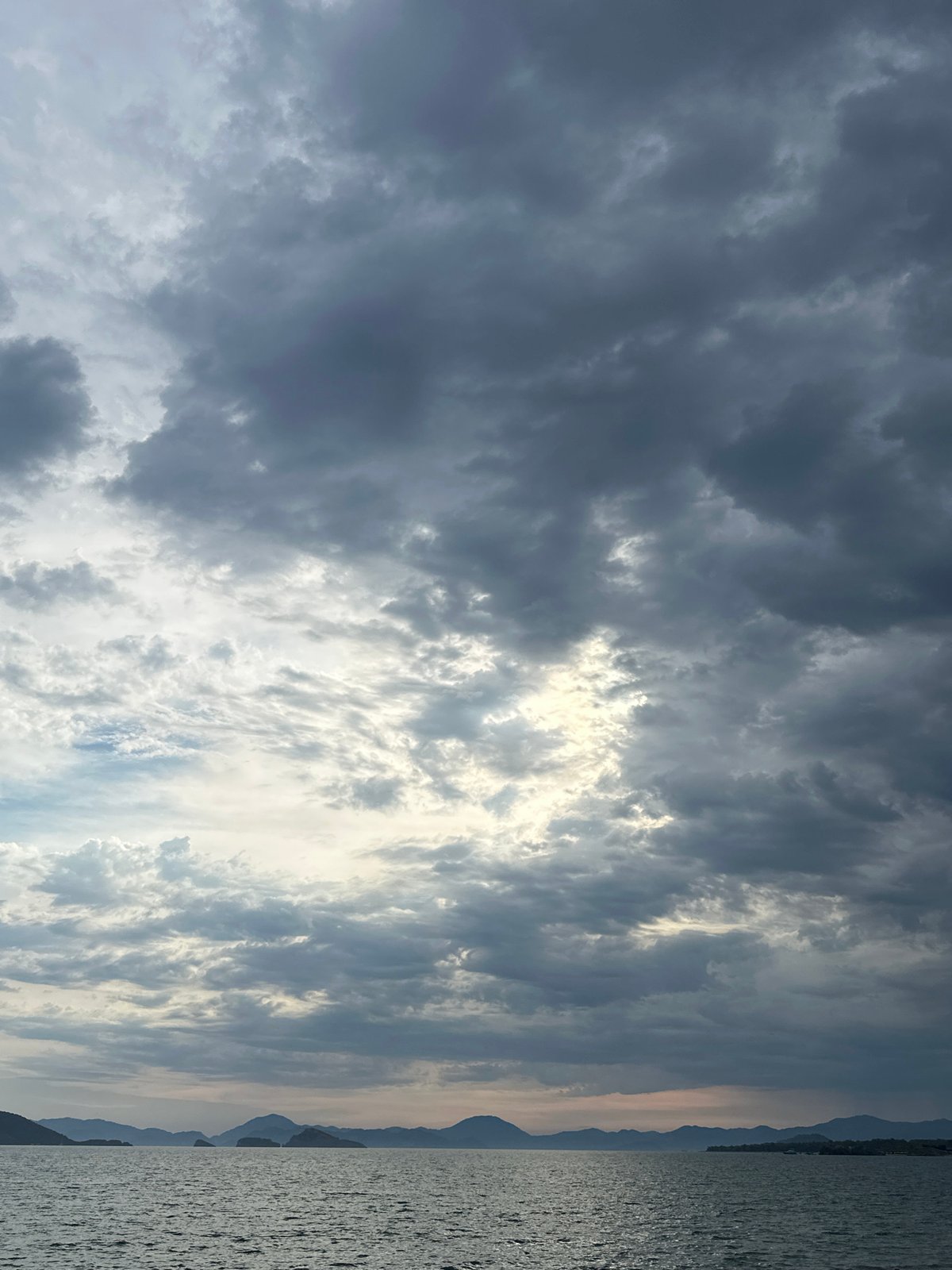 Beachgoers enjoy cloudy afternoon at Fethiye Turkey coast