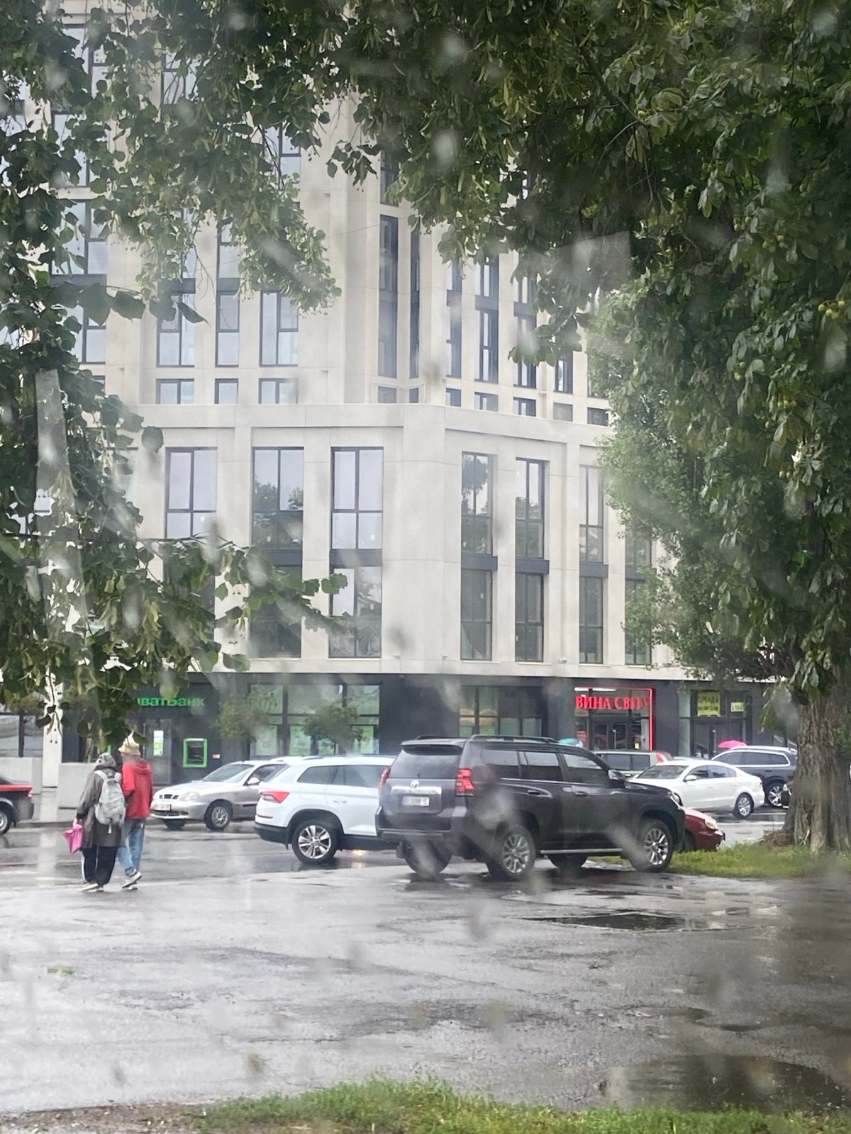 Rainy morning street and bus scenes in Nyzhni Mlyny, Ukraine
