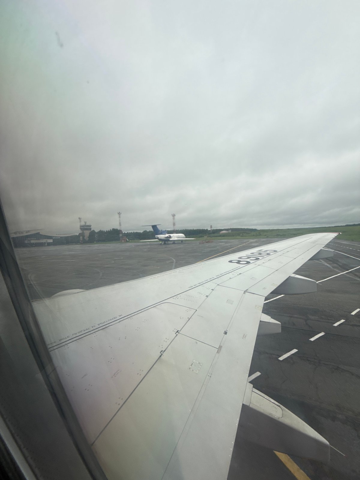 Flight lands at Izhevsk Airport during foggy morning conditions