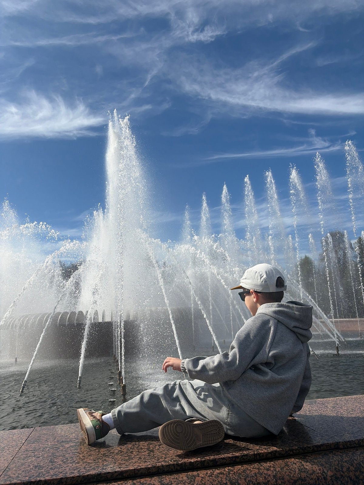 Spring day brings visitors to Saint Petersburg fountains and parks