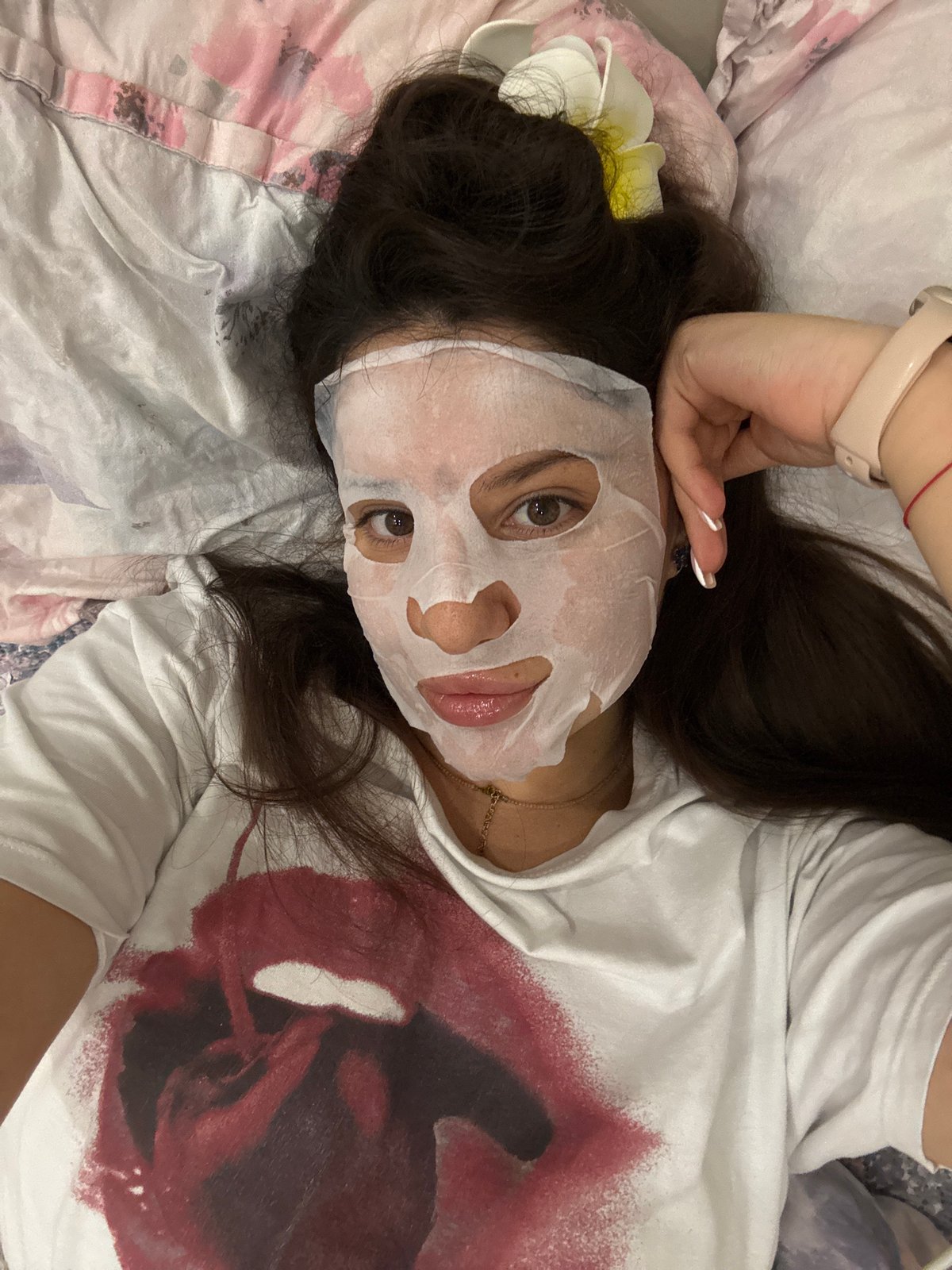 Woman enjoys skincare routine with facial mask in Burgas