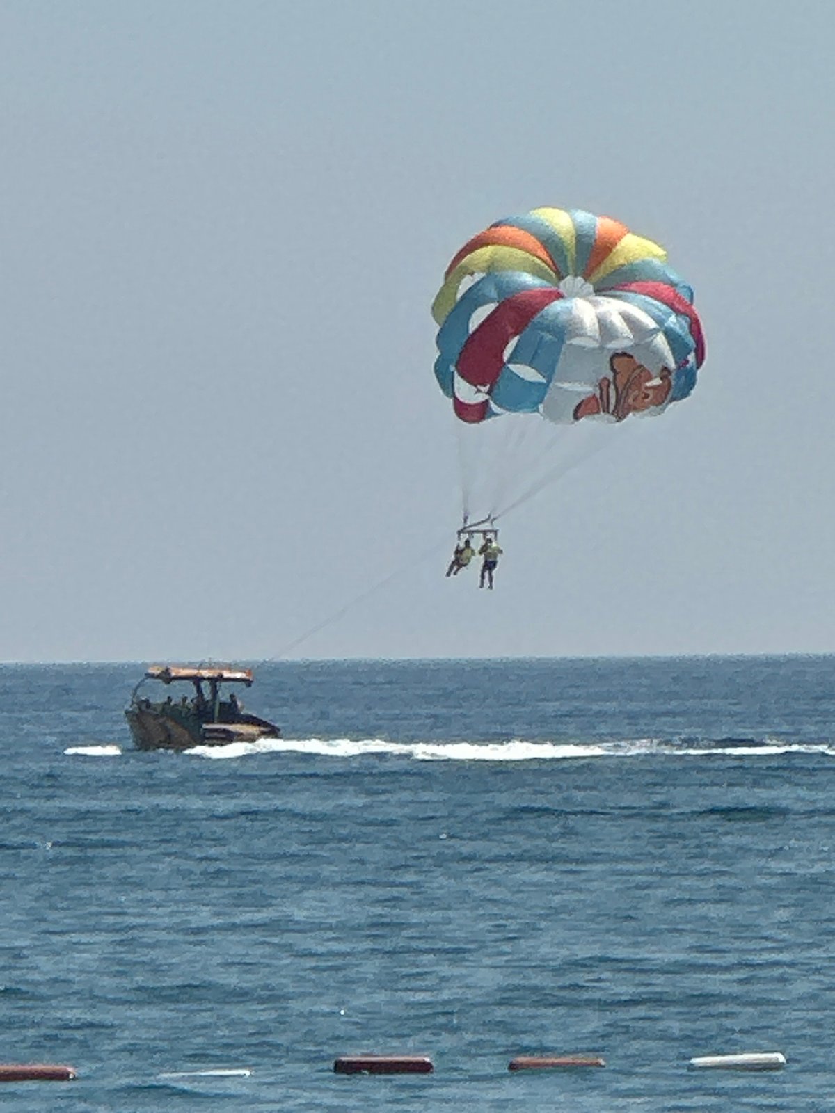 Nemo-themed parasail flies over calm Adriatic waters off Boreti
