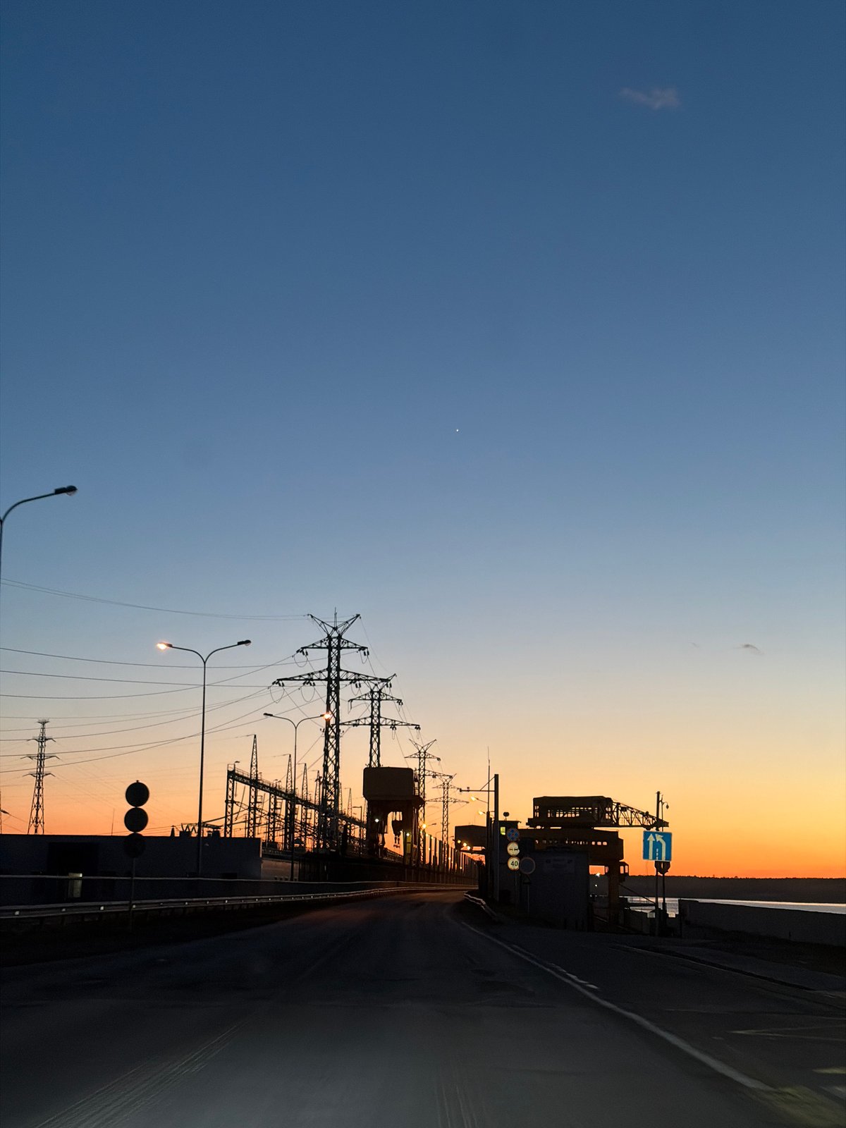 Evening drive through industrial Chaikovsky captured at dusk