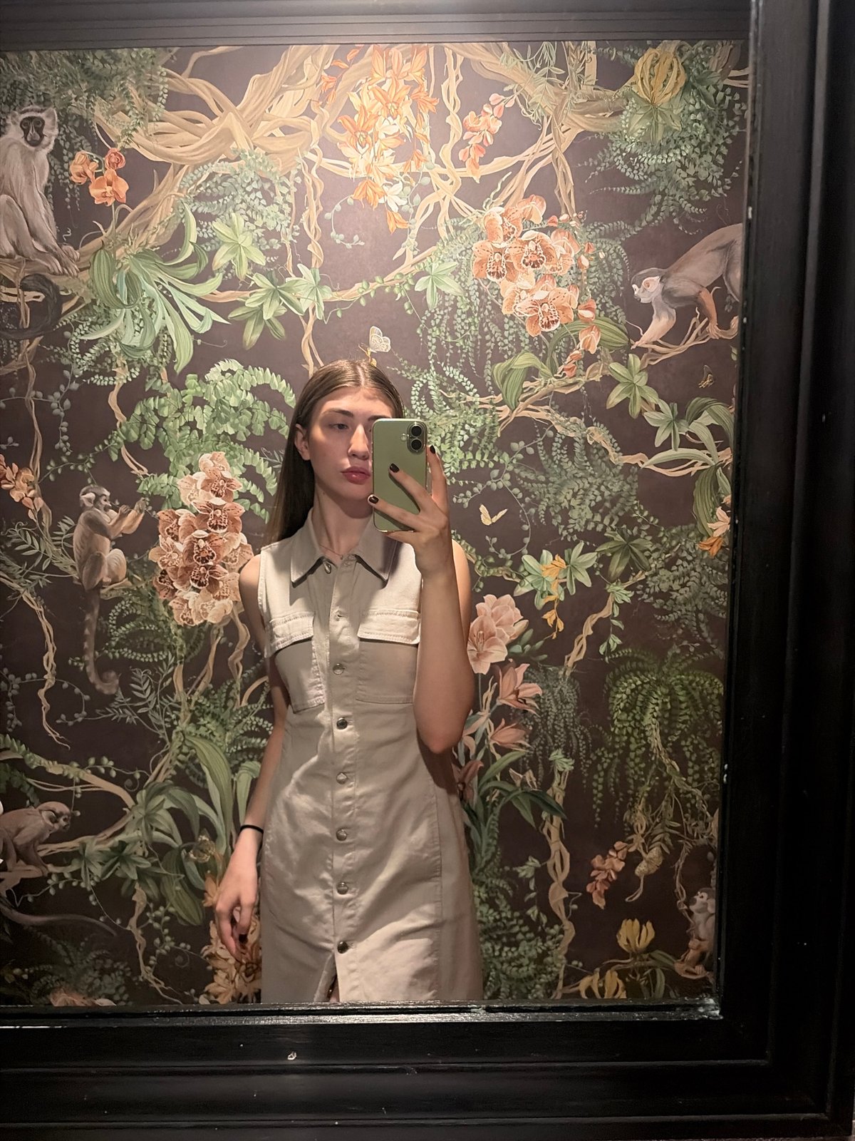 Woman takes mirror selfie in Krasnoyarsk, Russia
