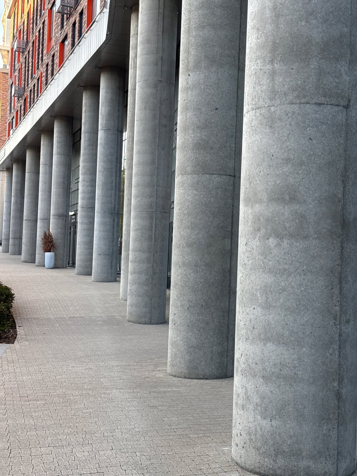 Woman documents modern Izhevsk architecture and residential areas