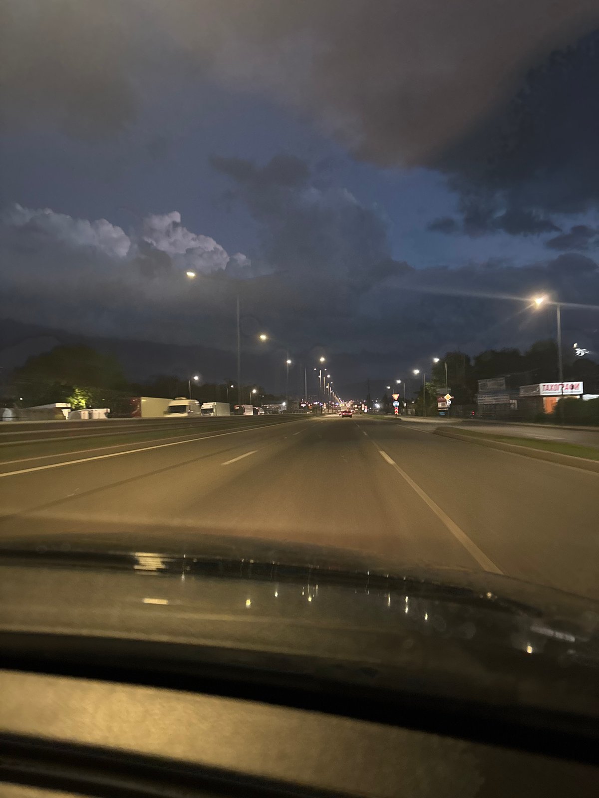 Evening highway traffic recorded in Sofia under stormy skies