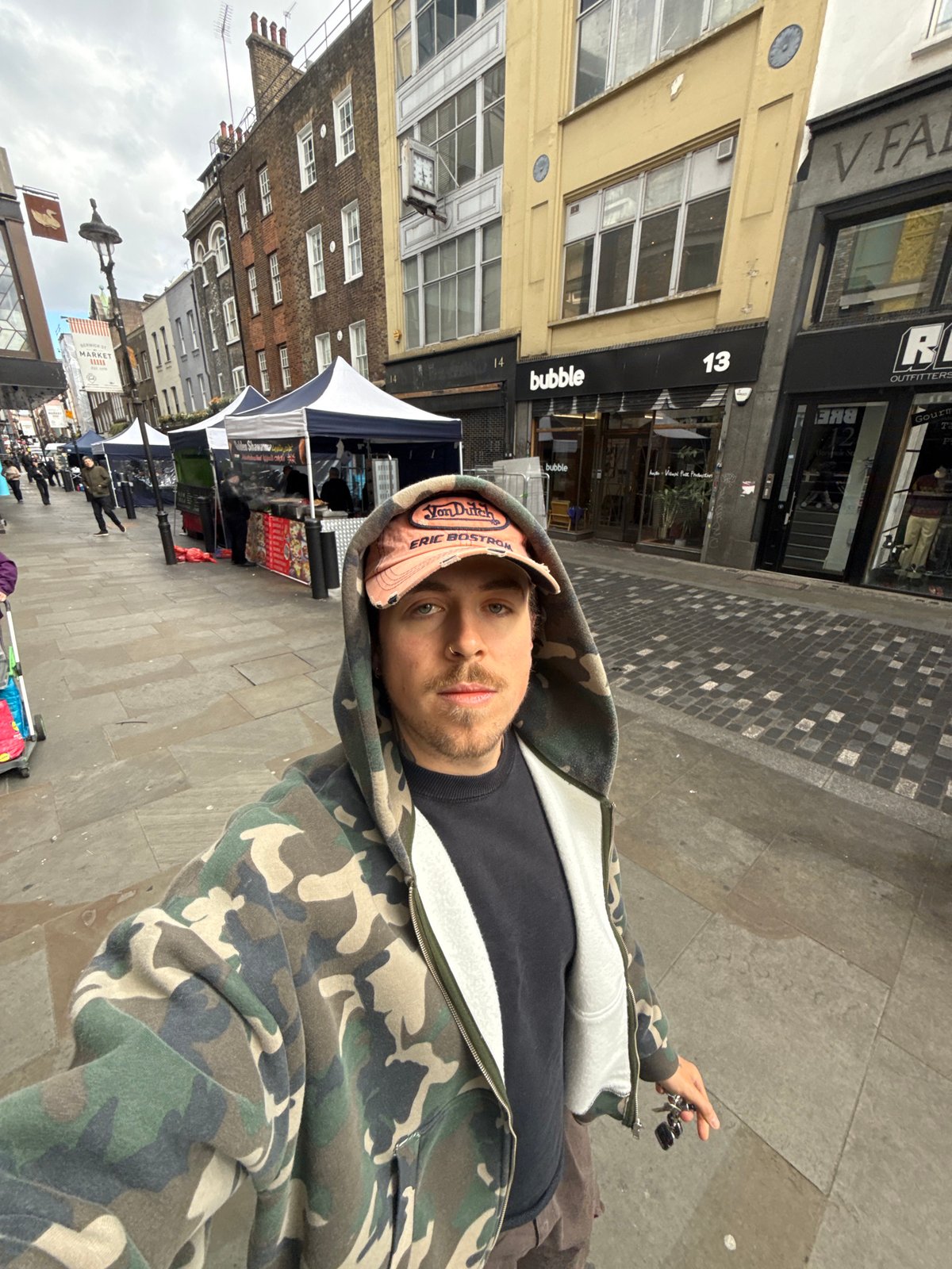 Morning street activity documented on London's Berwick Street