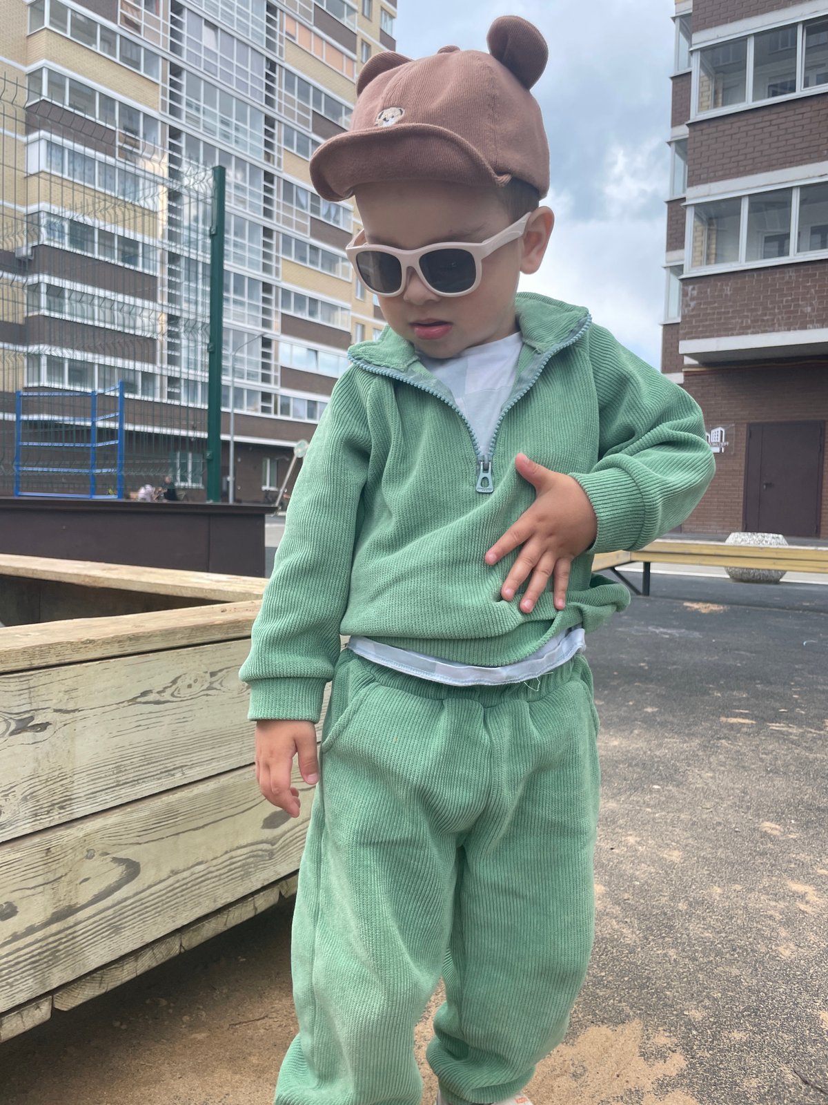 Toddler in bear hat spotted playing across Izhevsk locations
