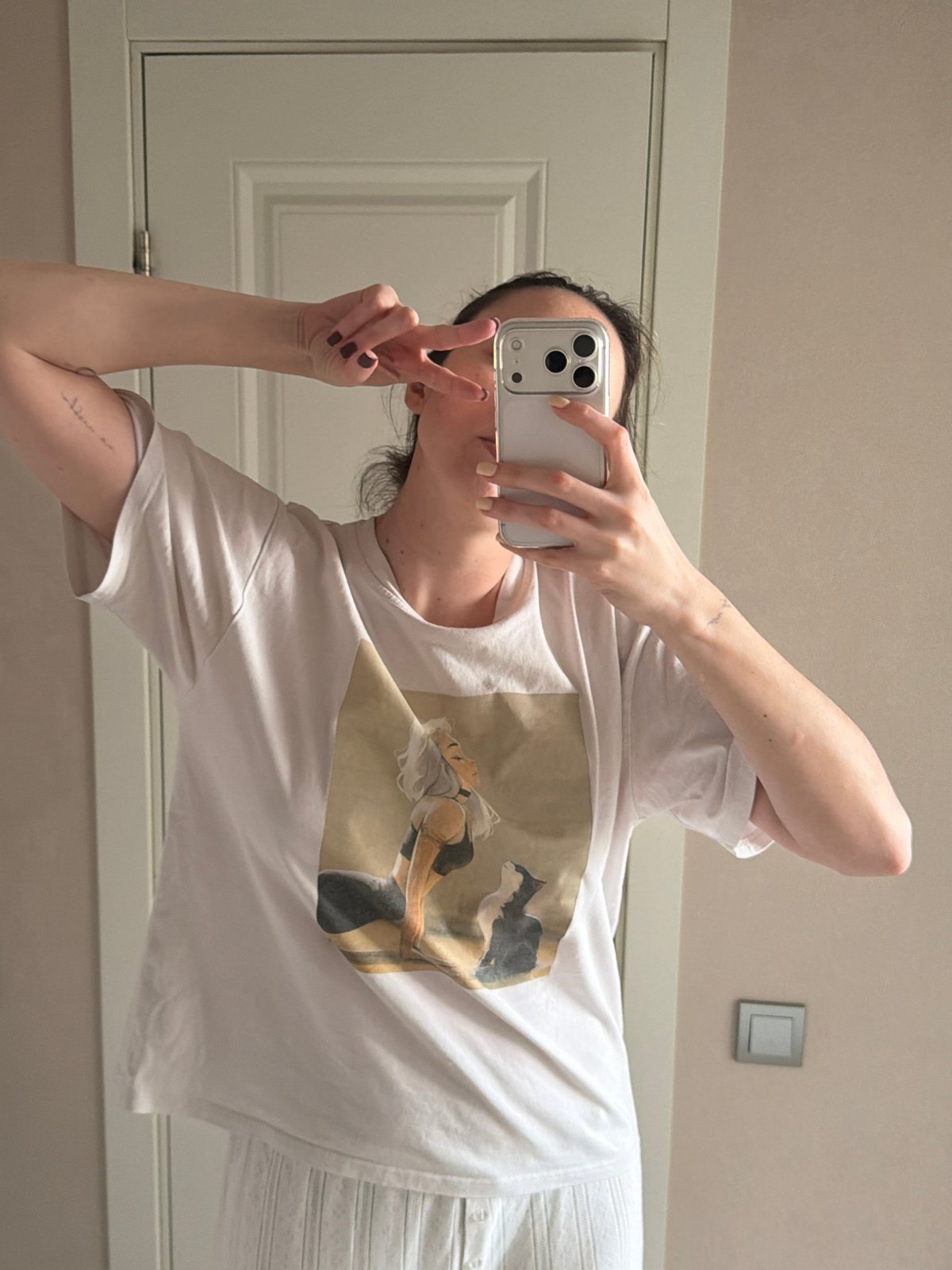 Casual indoor moments captured in Novoaleksandrovka including selfie, artwork