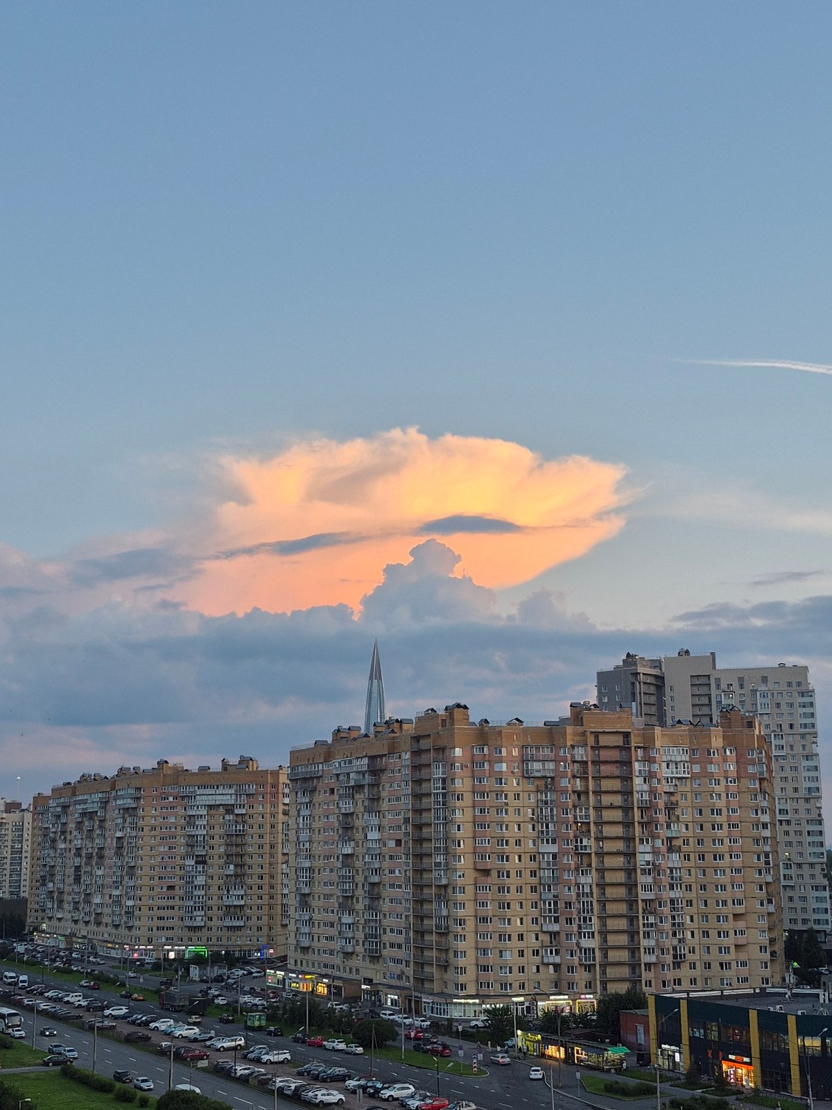 Saint Petersburg evening skyline and a gym interior