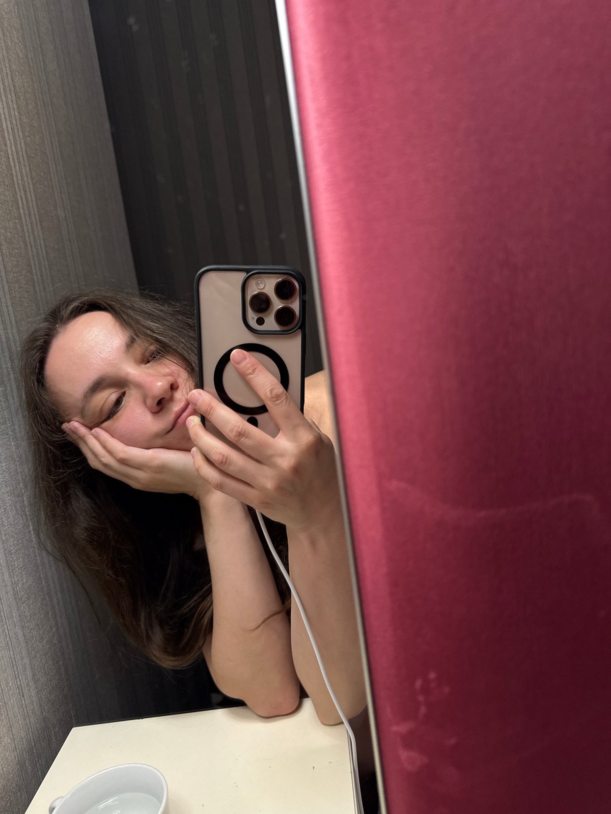 Woman takes mirror selfie in Moscow