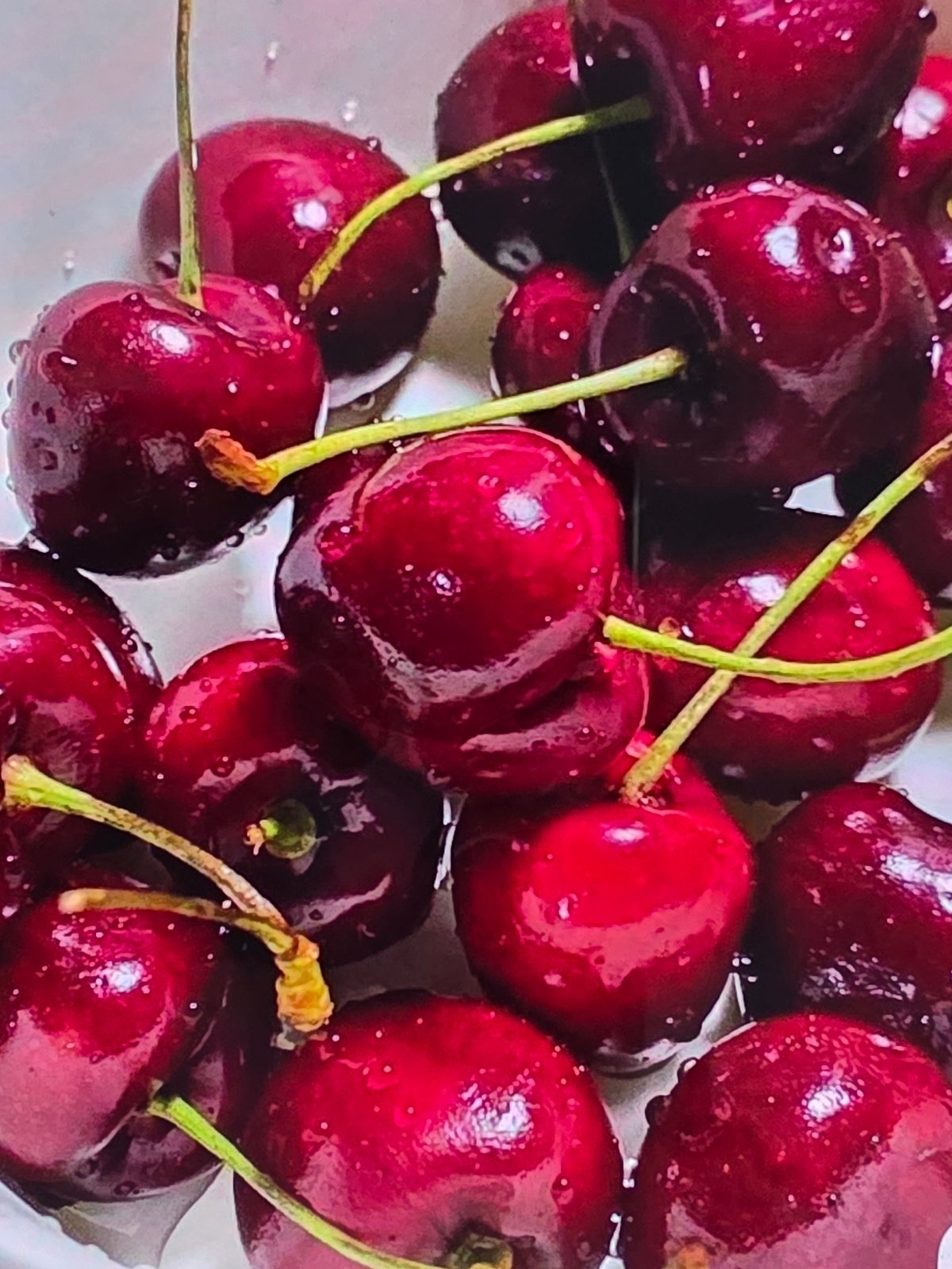 Fresh fruit preparation with cherries and sugared strawberries