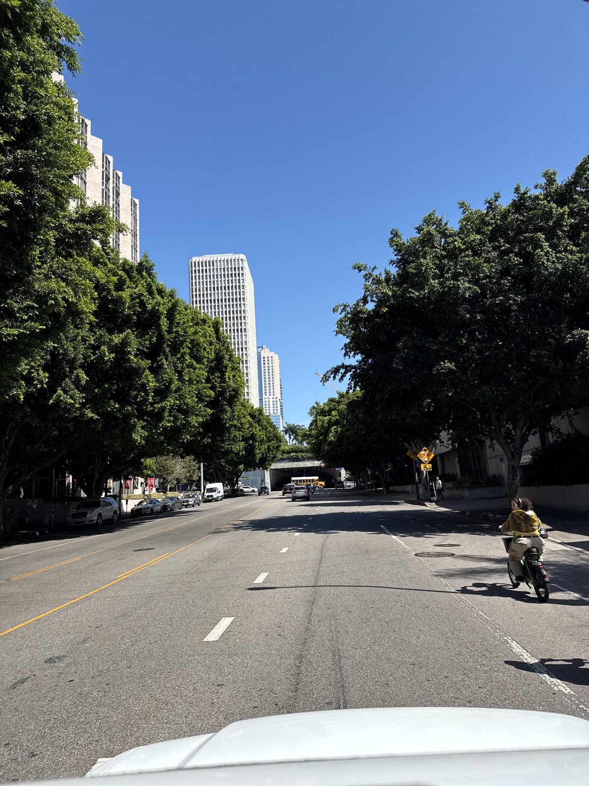 Heavy traffic documented on sunny downtown Los Angeles streets