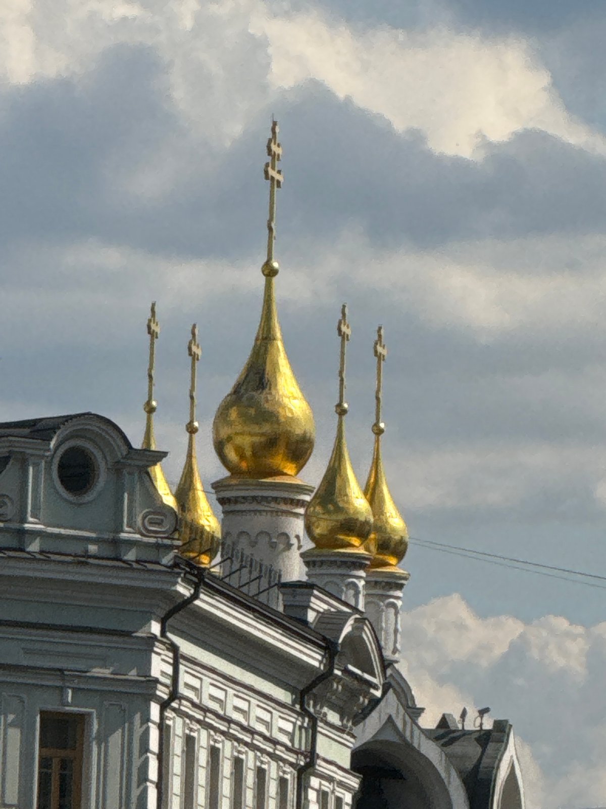 Visitor documents Orthodox church and decorative displays in Moscow