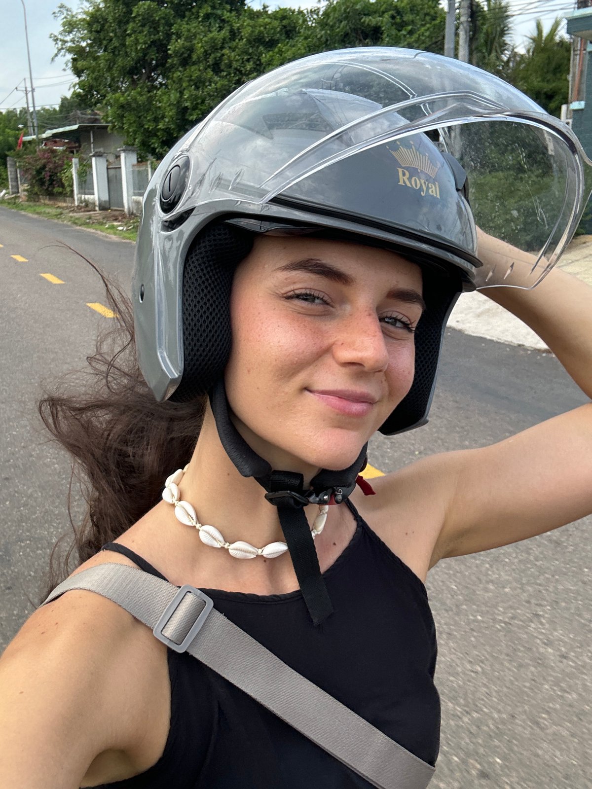 Motorcycle journey documented through selfies in Mũi Né, Vietnam
