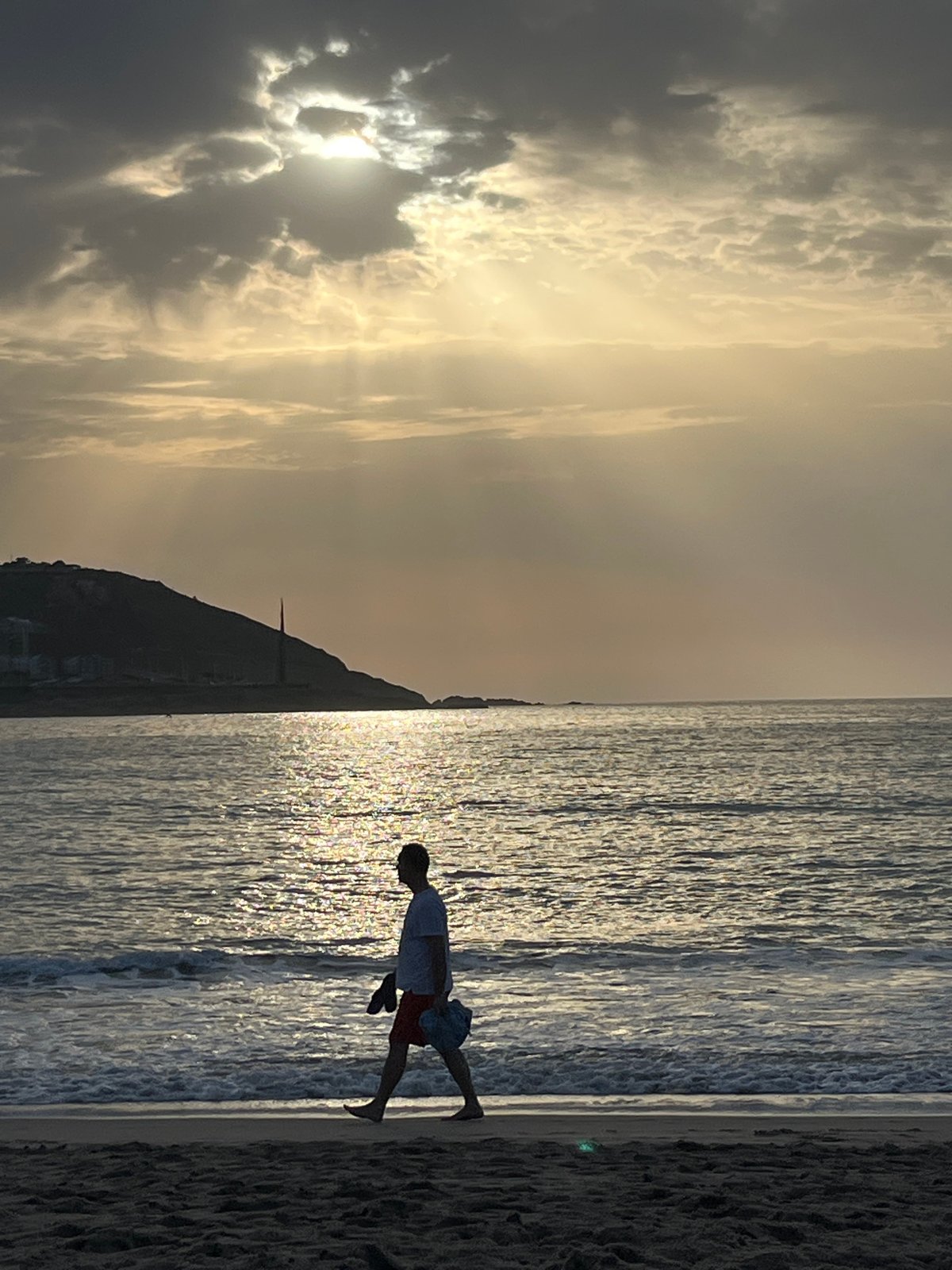 Evening sunset scenes captured across A Coruña beaches and streets