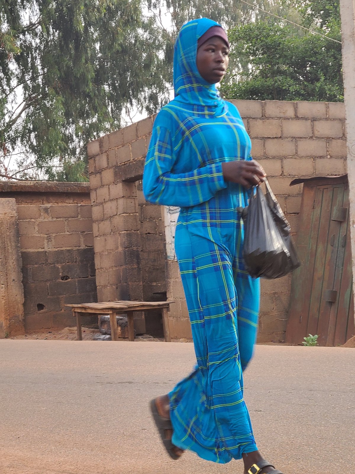 Ordinary street life documented across Jos, Nigeria neighborhoods