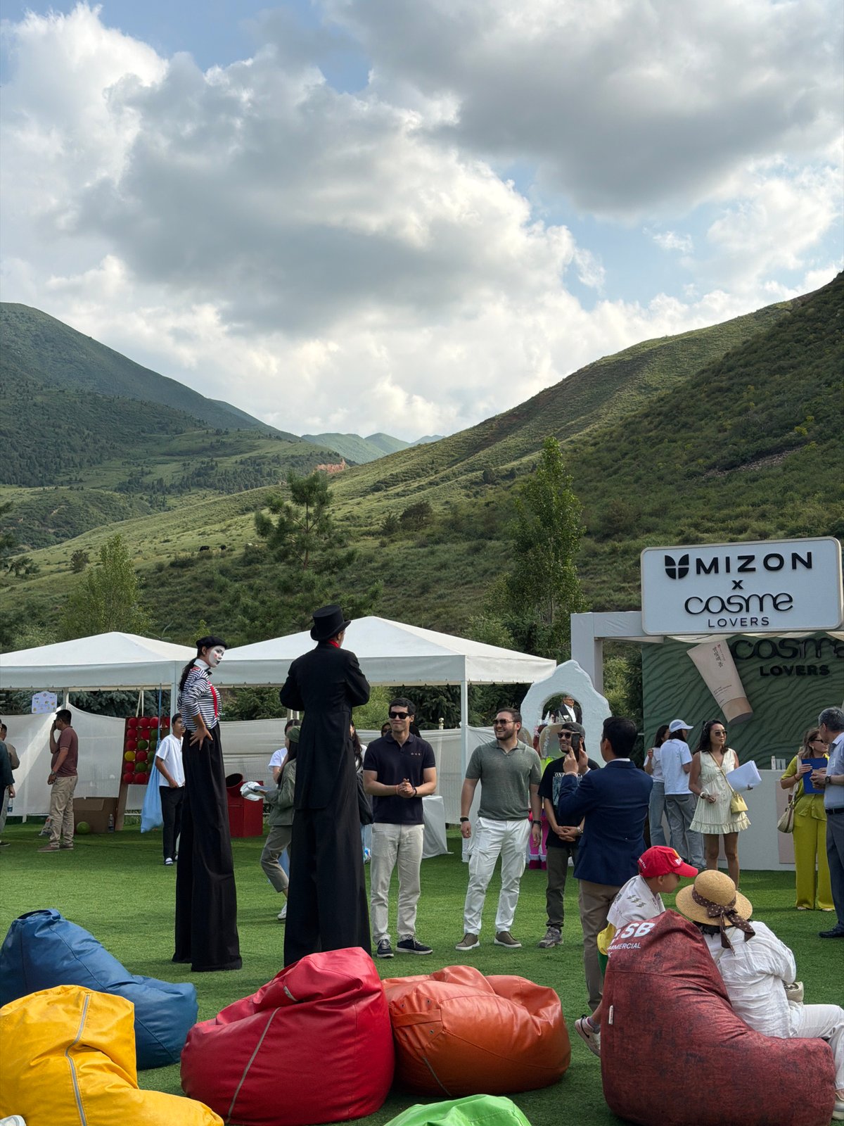 Outdoor festival with performers, crafts, food held in Bishkek