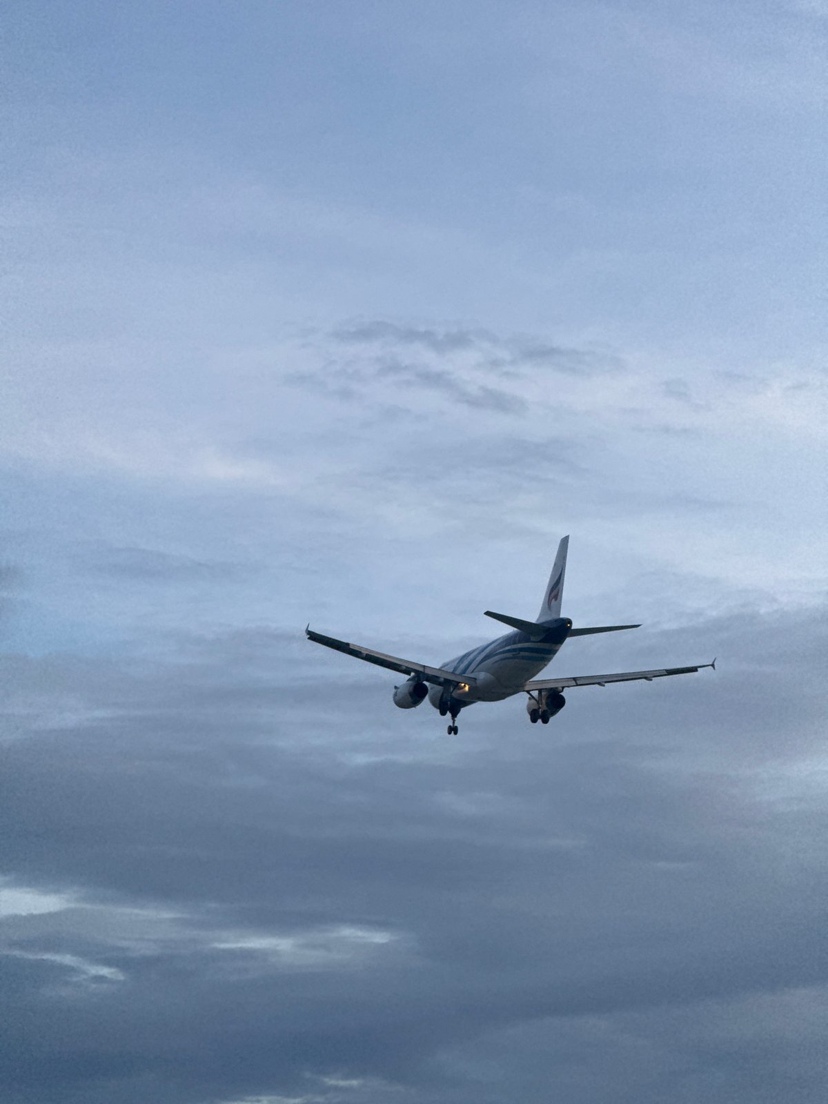 Ko Samui morning: beaches, a Buddhist temple, and a landing plane