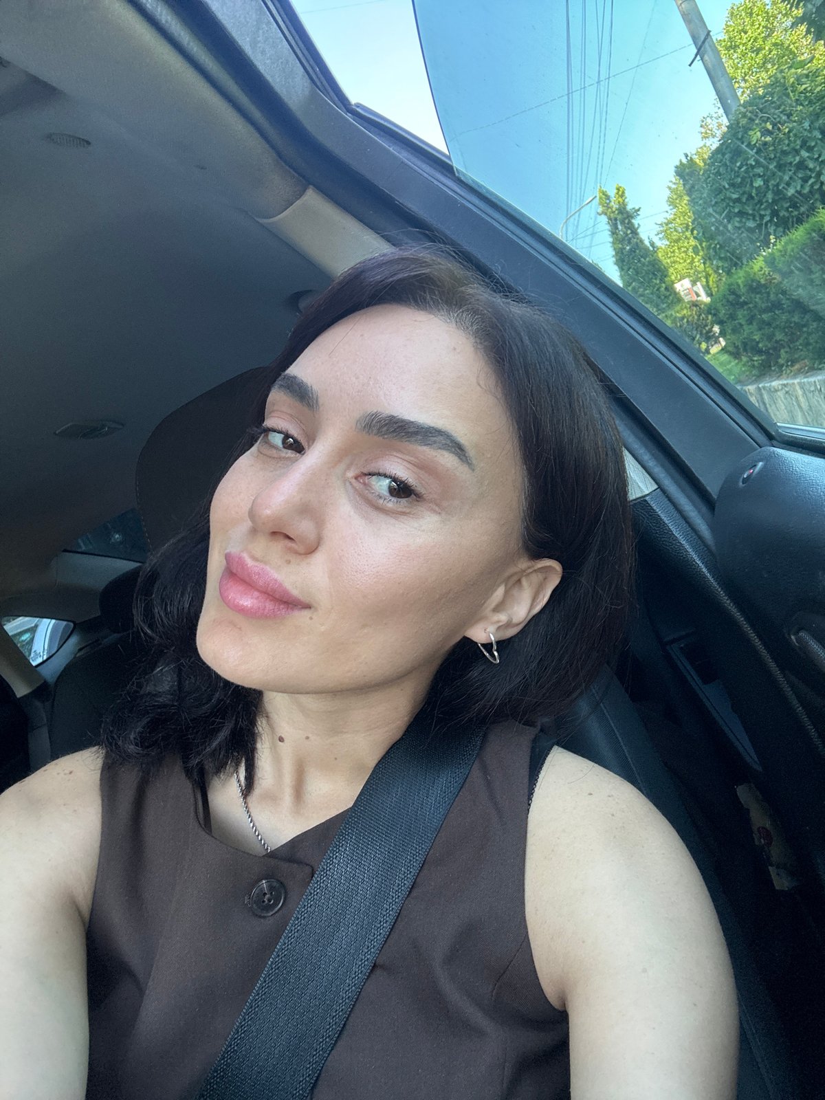 Driving through Tbilisi traffic on a sunny afternoon