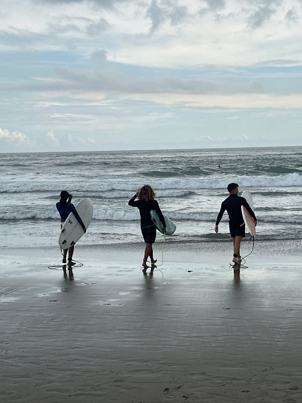 Morning surf activity captured at North Kuta beach