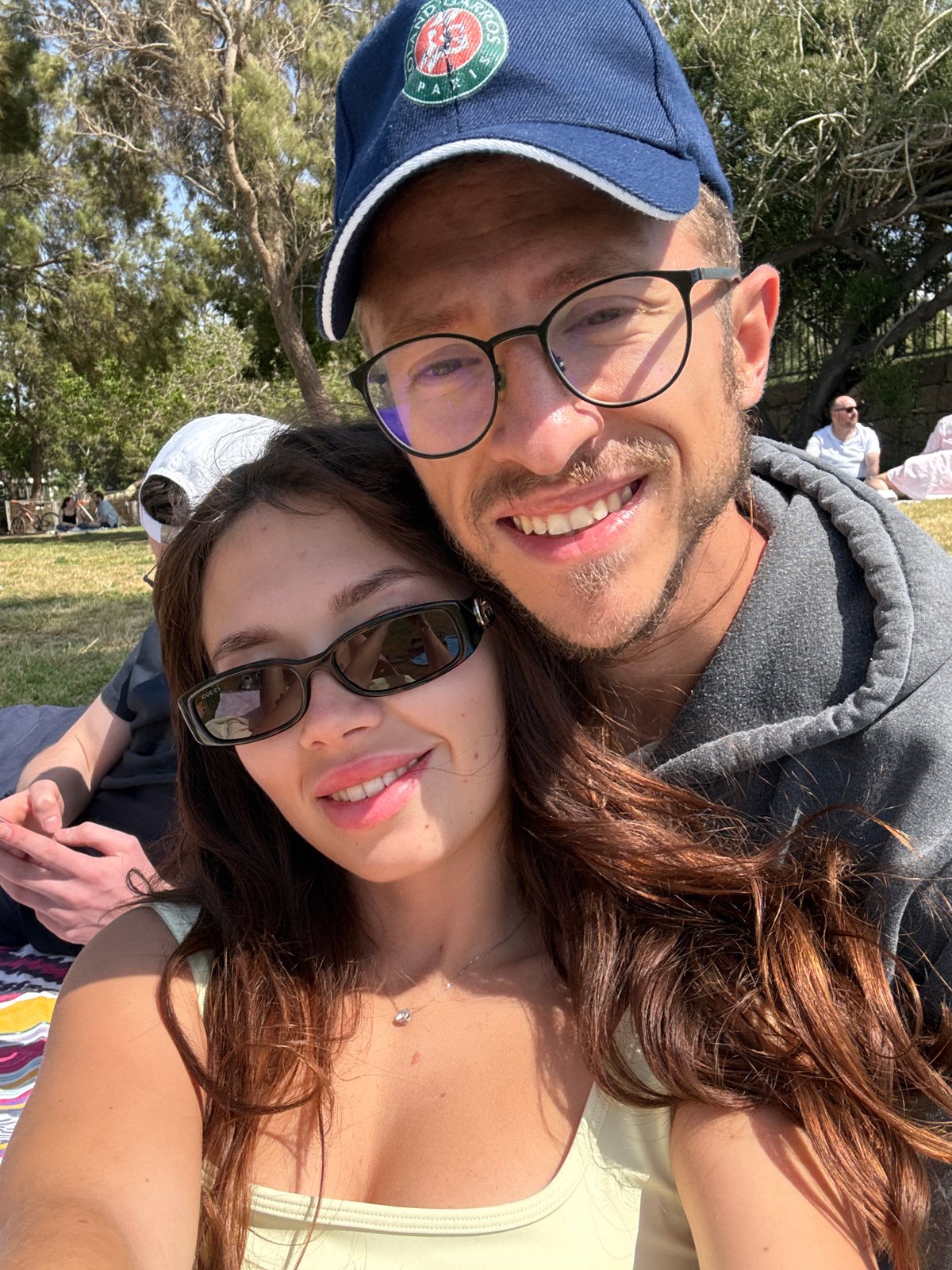 Couple enjoys sunny afternoon in Tel Aviv park