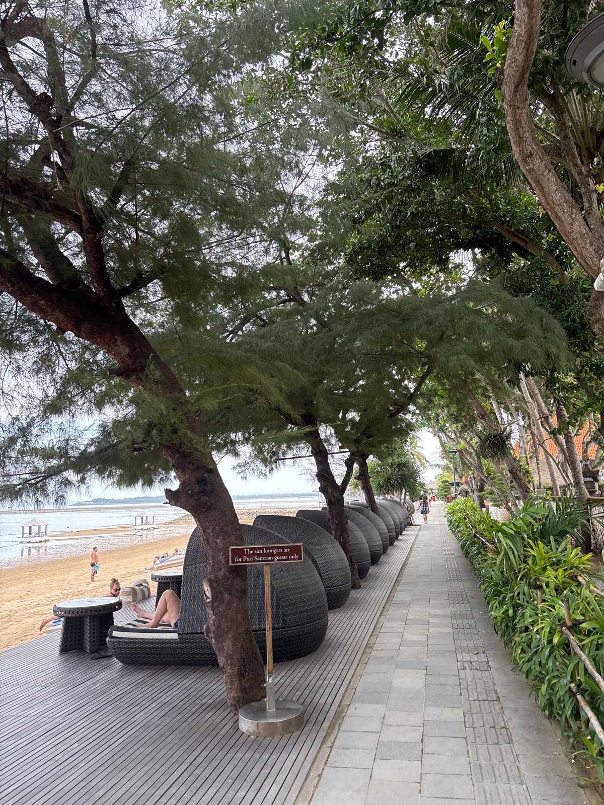 Tourist amenities documented along Denpasar beachfront in morning walkthrough