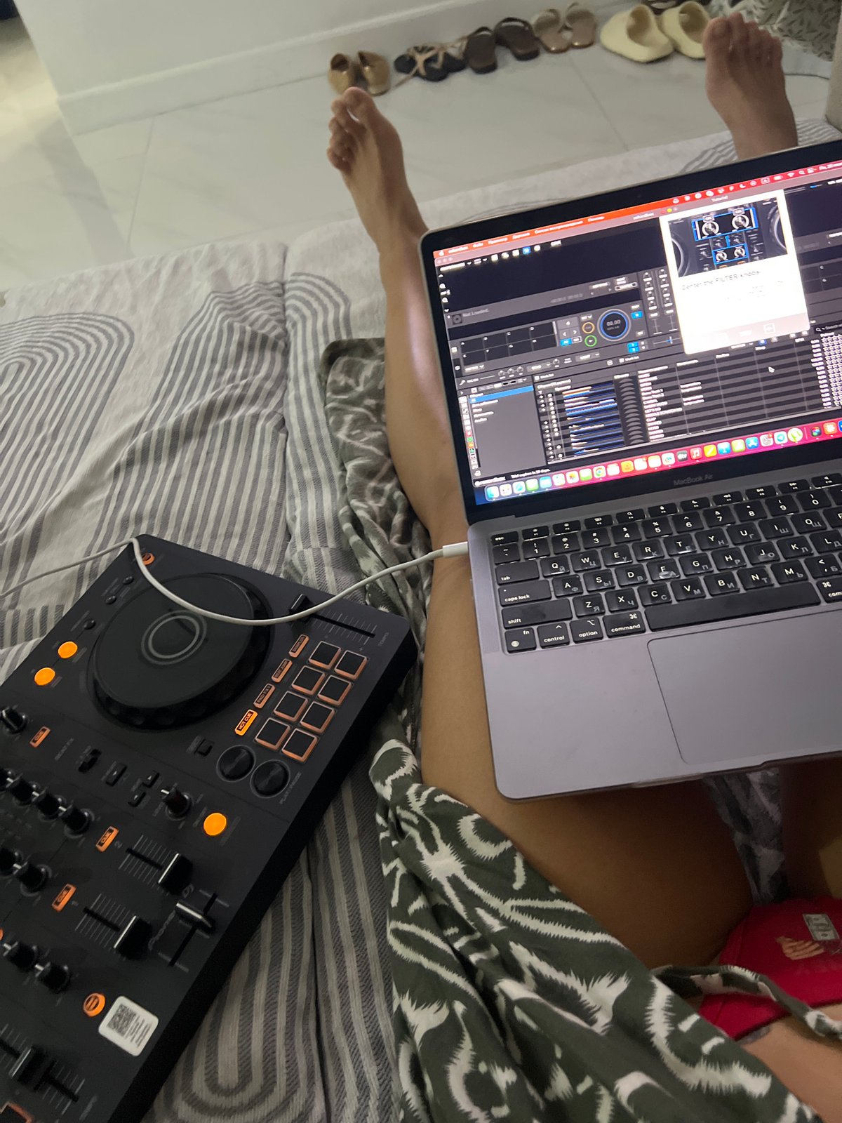 Pioneer DJ controller and MacBook on bedroom bed, Choeng Thale
