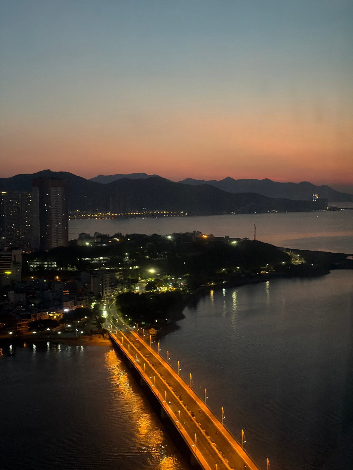 Tran Phu Bridge glows under Nha Trang's twilight sky