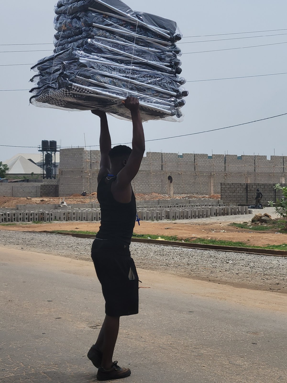 Everyday street commerce documented in Kwamba, Nigeria