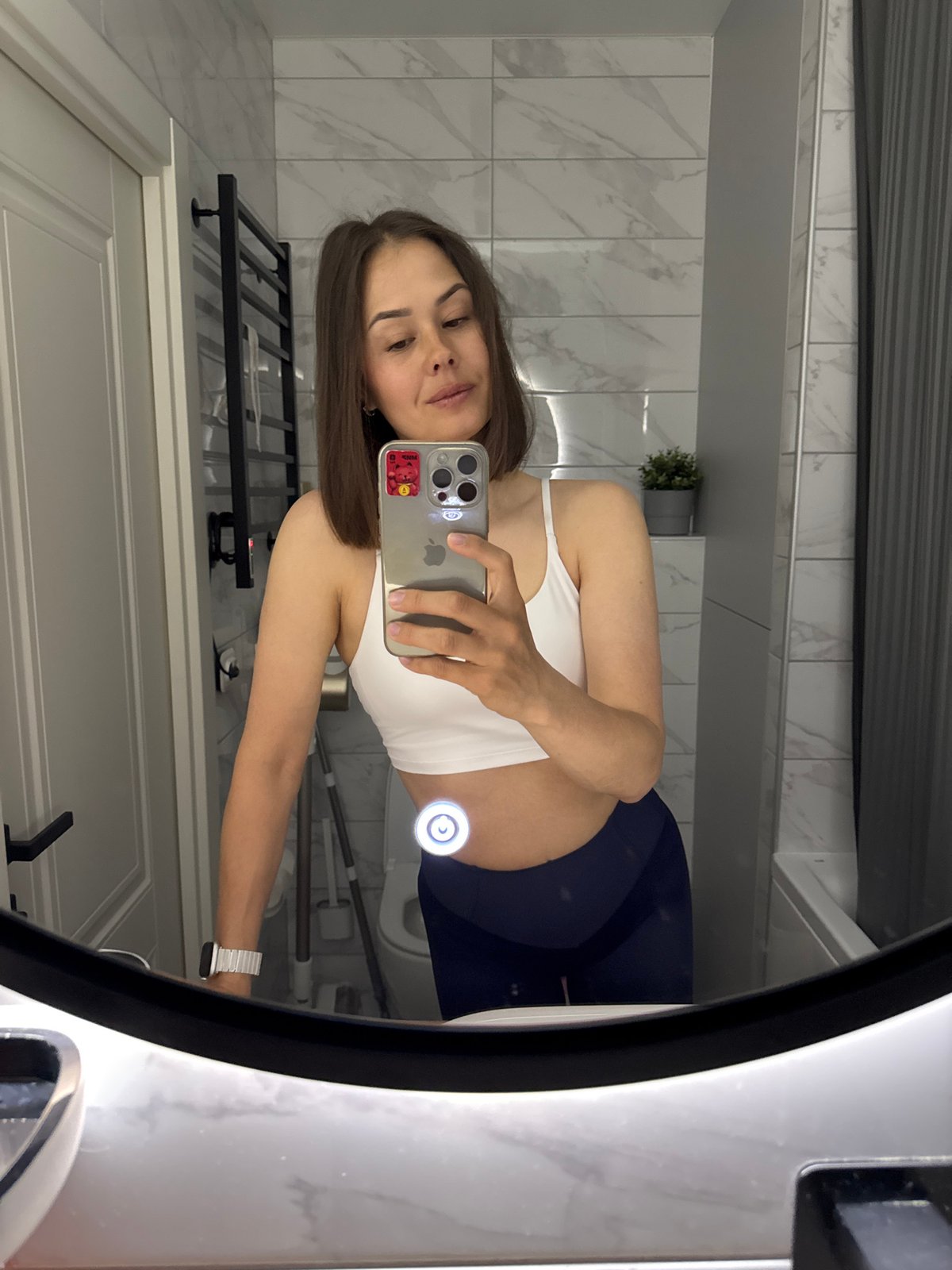 Woman takes bathroom selfie in Chaikovsky, Russia