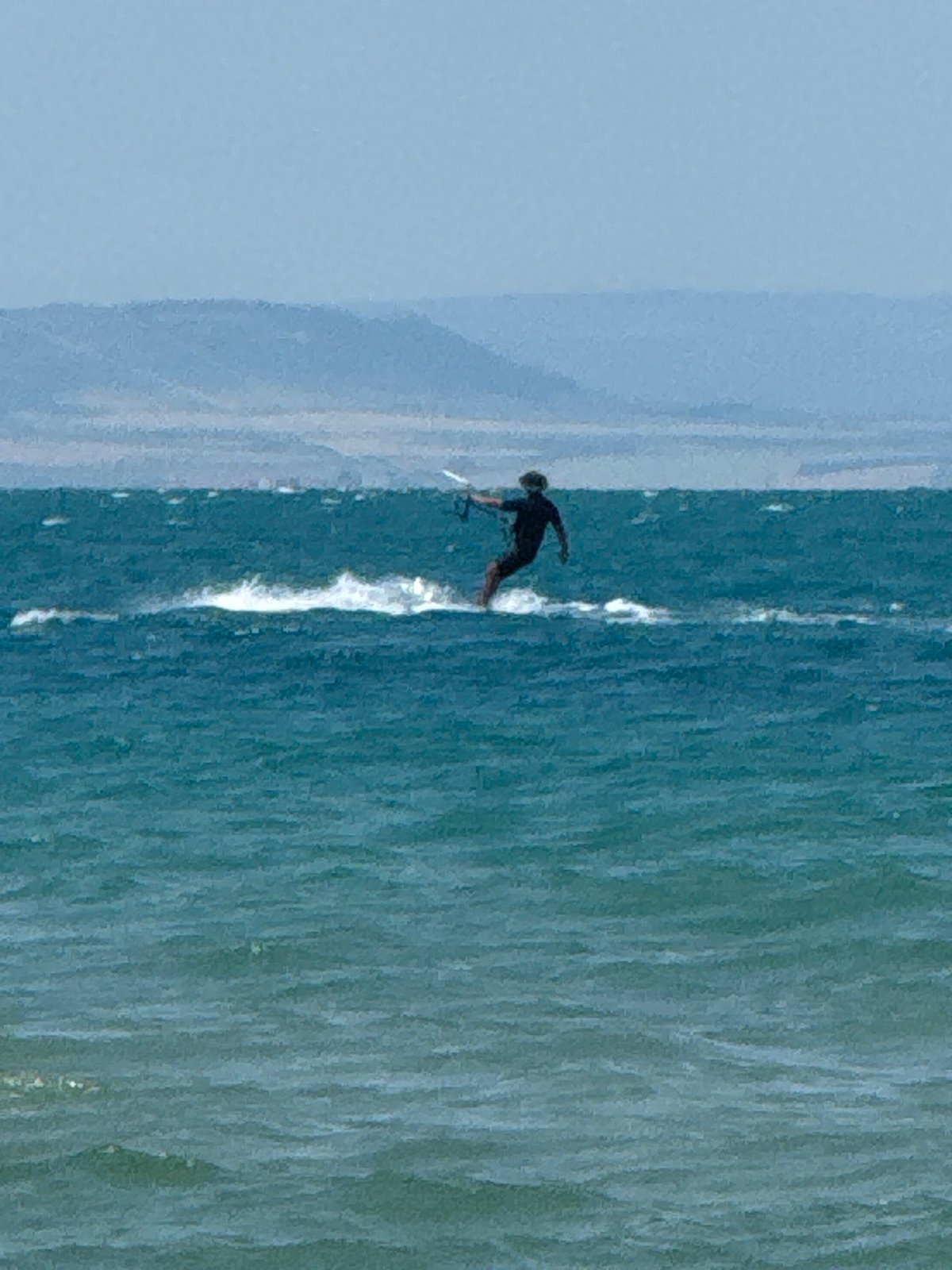Kitesurfing and beach scenes on a Sozopol morning