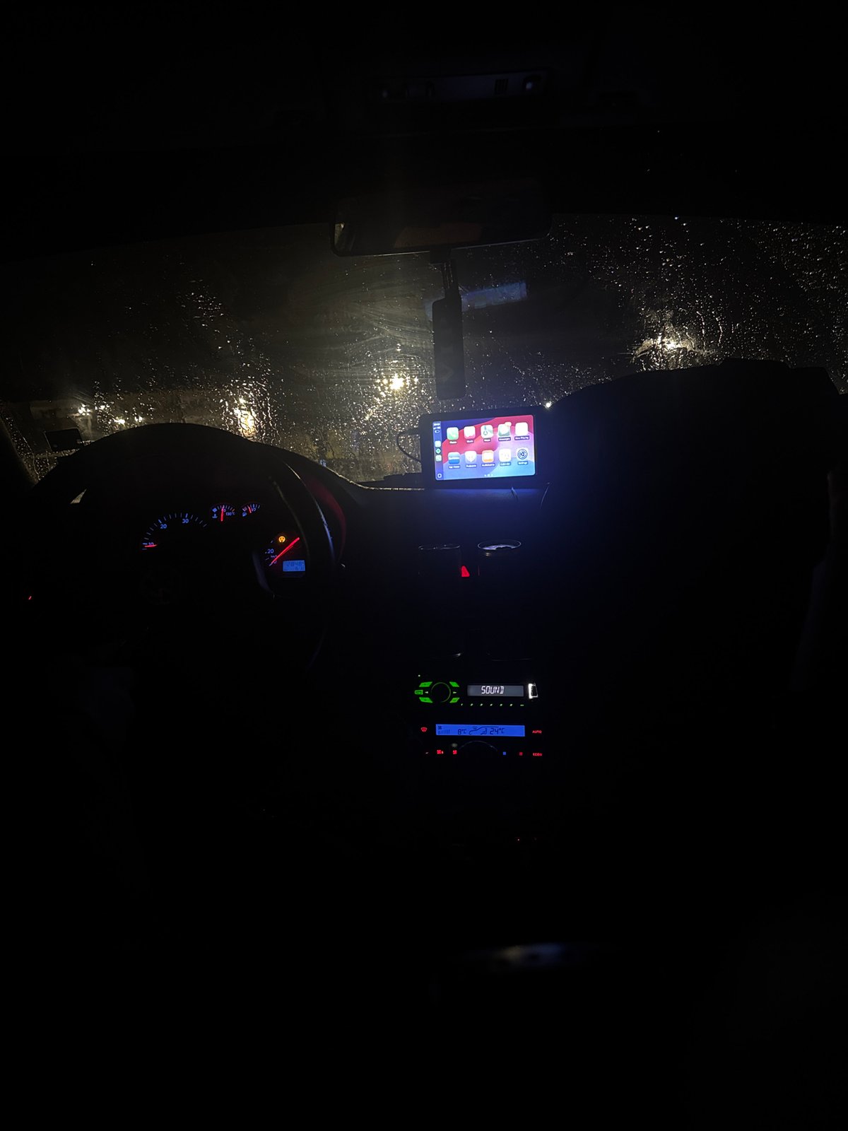 Nighttime car interior view during rain in Bulgaria